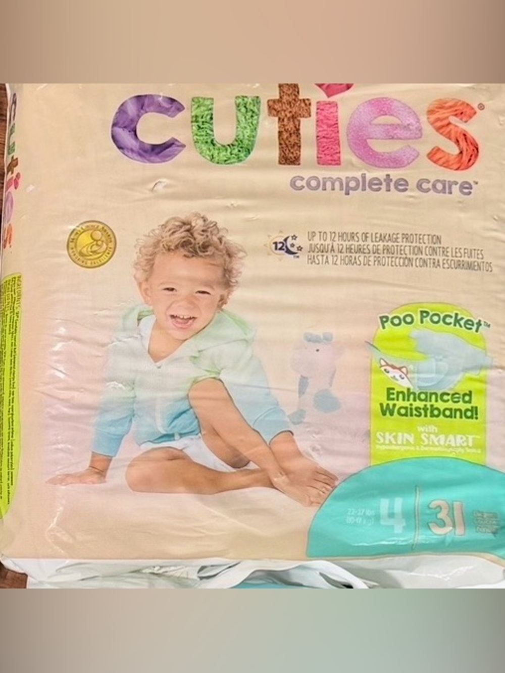 Size 4 qty 31 diapers 1 Pkg unopened Cuties complete Care New 12 hours protect